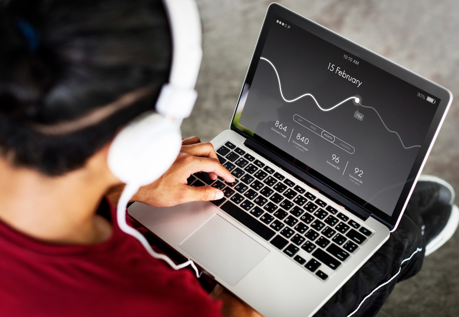 Analyst monitoring website event data and user statistics on laptop